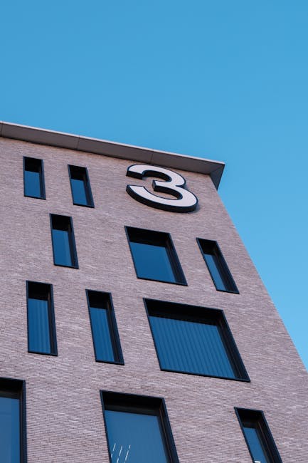 Modern building with a large number 3 signage